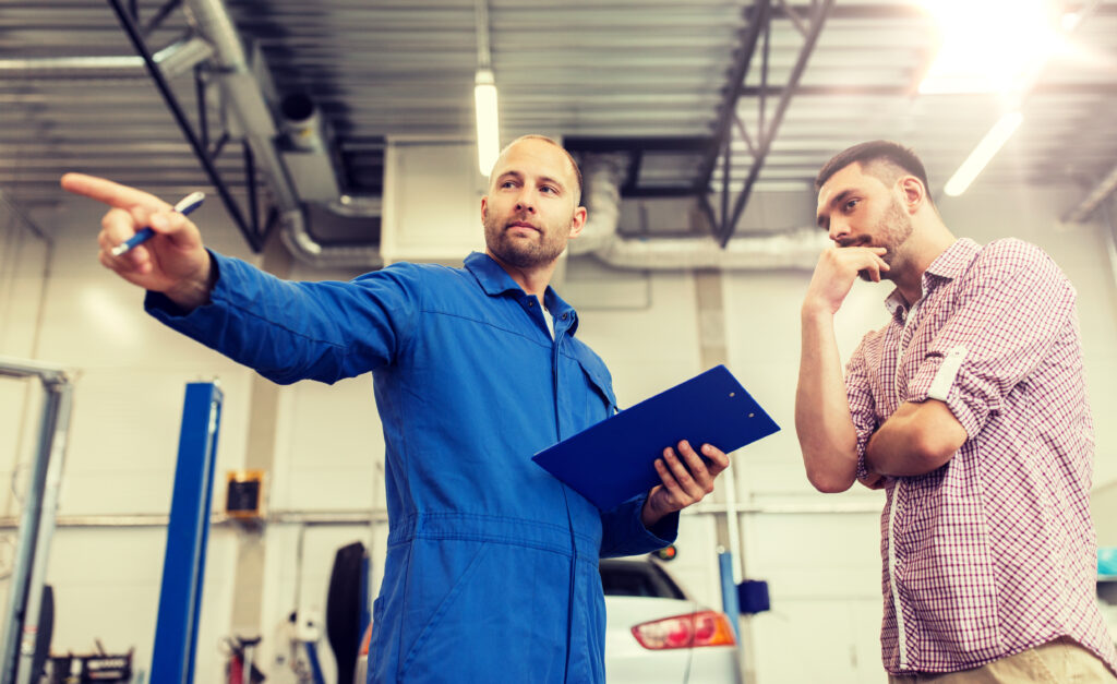 customer and mechanic talking